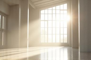 Modern interior with ample natural light streaming through large windows